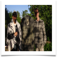 Yossi and his cousin at his grandfather's grave